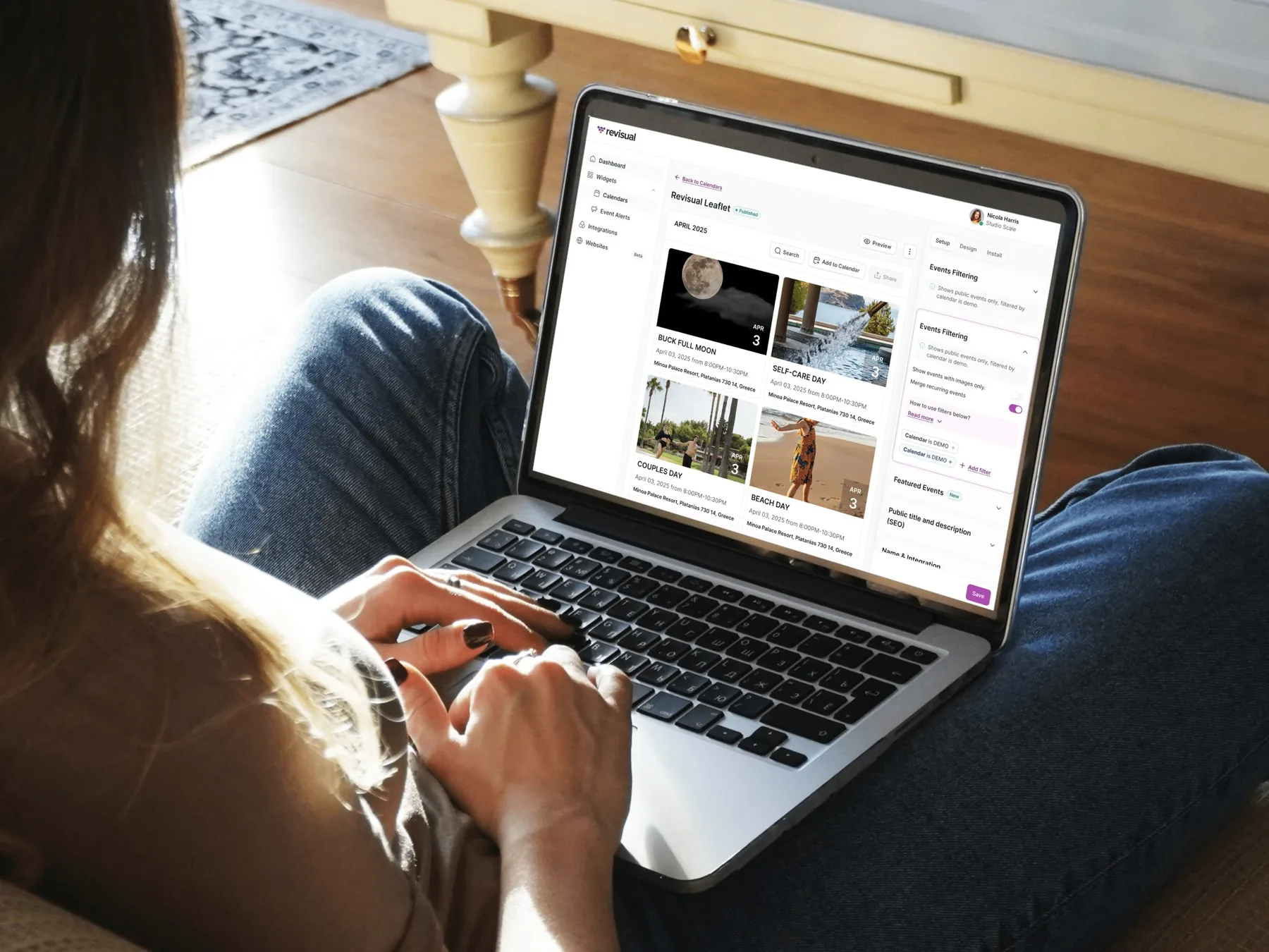 Revisual web app on a laptop, showing an event calendar with filters and featured events