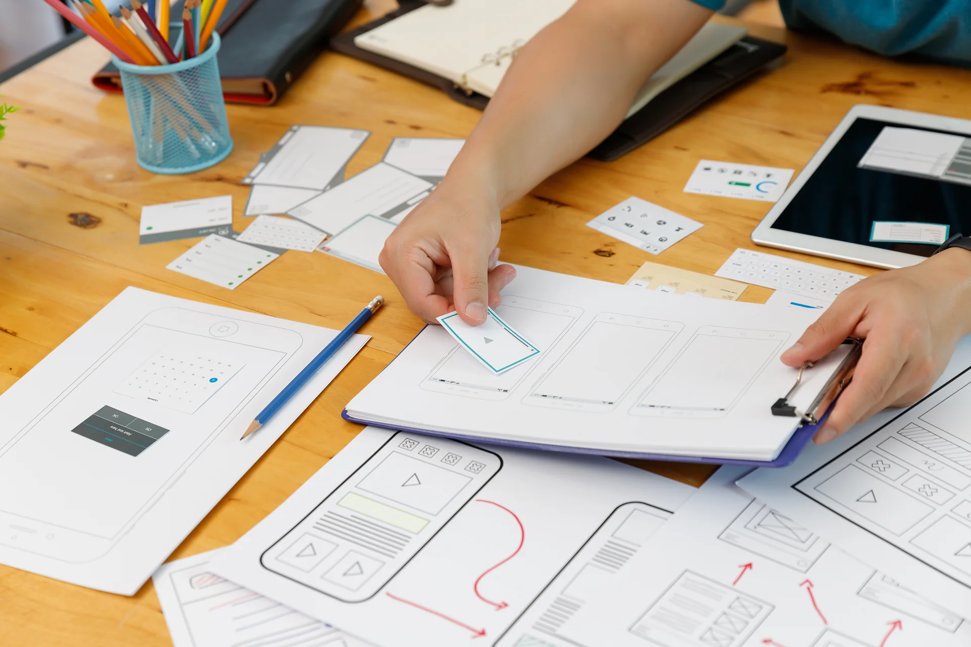 Product design workspace with wireframes